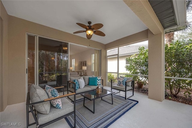 view of patio / terrace featuring ceiling fan