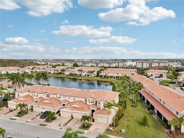 drone / aerial view with a water view