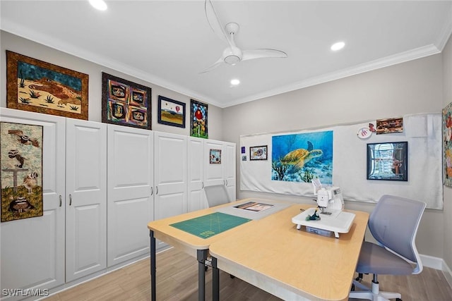 office area with ceiling fan, light wood-type flooring, and crown molding