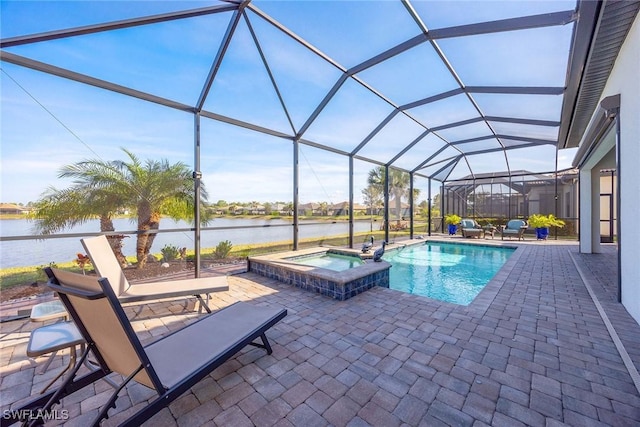 view of swimming pool featuring a lanai, a patio area, a water view, and an in ground hot tub