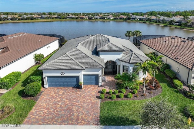 drone / aerial view with a water view