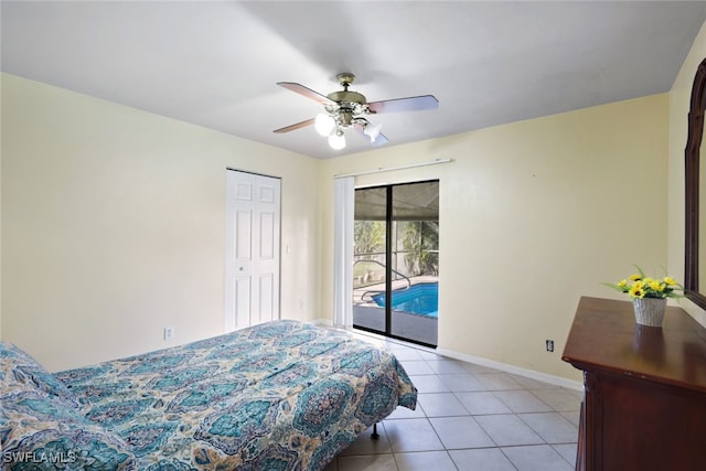 bedroom with a closet, access to outside, ceiling fan, and light tile patterned flooring