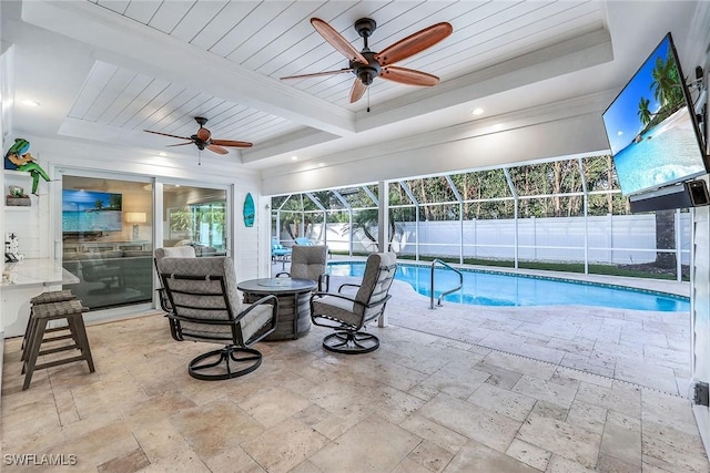 view of pool featuring a lanai and a patio