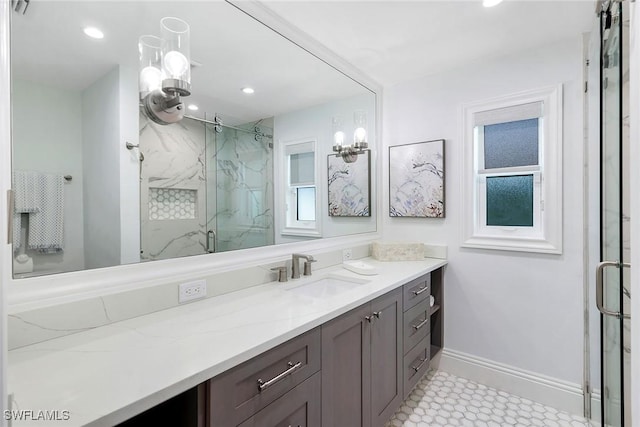 bathroom featuring vanity and walk in shower