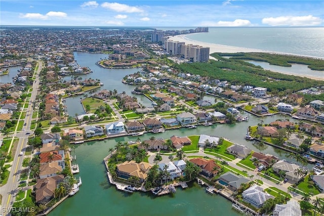 drone / aerial view with a water view