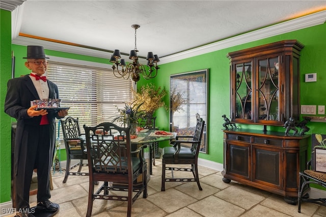 dining area with a chandelier and ornamental molding