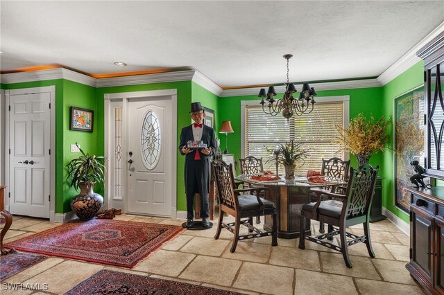 dining space featuring ornamental molding and a chandelier