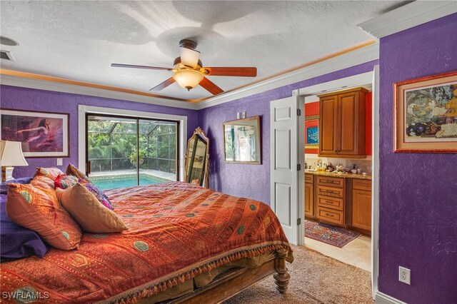 carpeted bedroom featuring access to outside, crown molding, ceiling fan, a textured ceiling, and connected bathroom