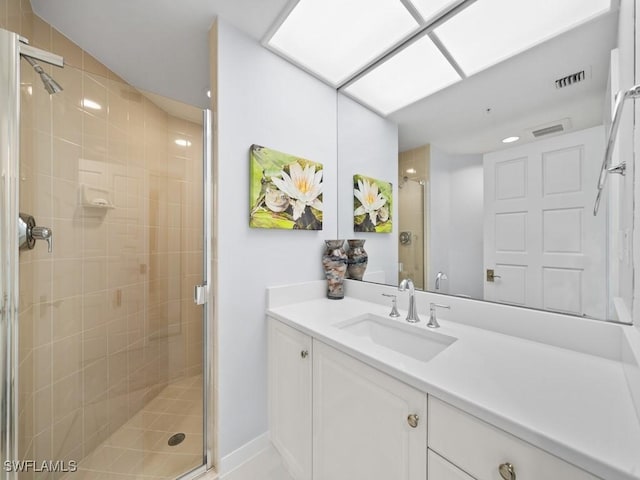 bathroom featuring vanity and walk in shower