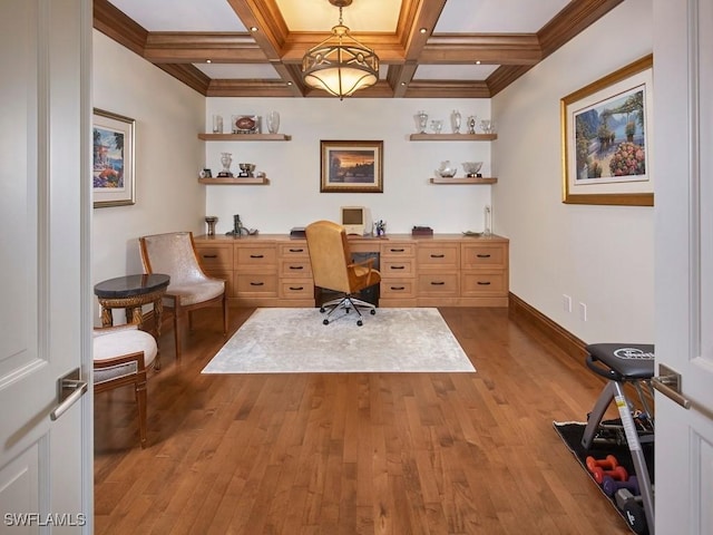 home office featuring beam ceiling, light hardwood / wood-style flooring, and coffered ceiling