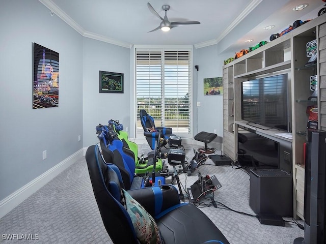 office space with ceiling fan, light colored carpet, and ornamental molding