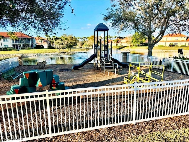 view of play area with a water view