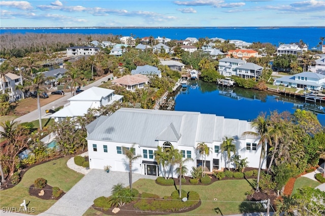 drone / aerial view with a water view