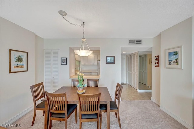 view of carpeted dining room