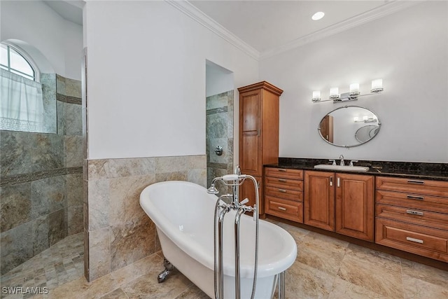 bathroom featuring vanity, separate shower and tub, ornamental molding, and tile walls