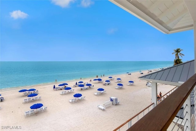 property view of water featuring a beach view