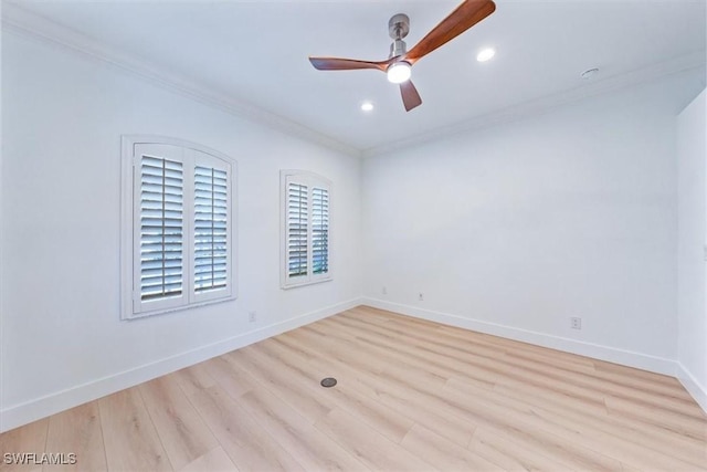 spare room with light hardwood / wood-style floors, ceiling fan, and crown molding