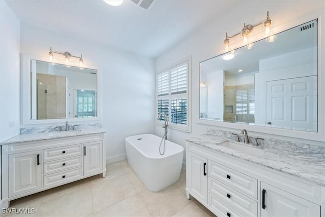 bathroom with separate shower and tub, tile patterned floors, and vanity