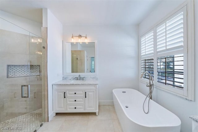 bathroom featuring independent shower and bath, tile patterned flooring, and vanity