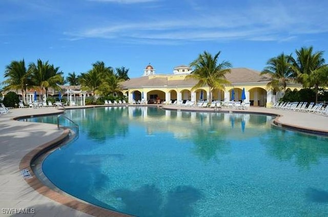 view of swimming pool featuring a patio area