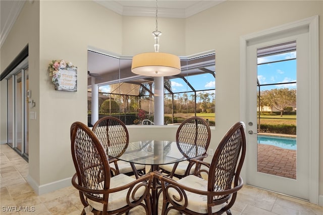 dining space featuring ornamental molding