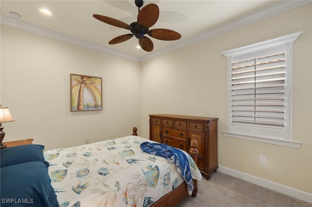 bedroom with ceiling fan, ornamental molding, and light carpet