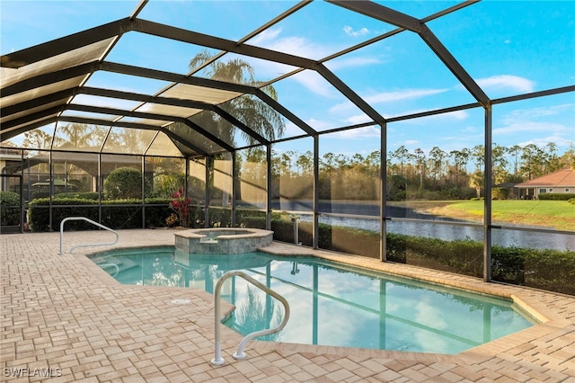 view of swimming pool featuring an in ground hot tub, a lanai, a patio, and a water view