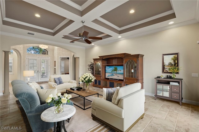 living room featuring french doors, coffered ceiling, and ornamental molding