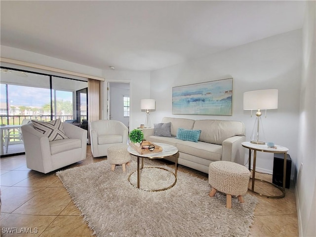 living room with light tile patterned flooring