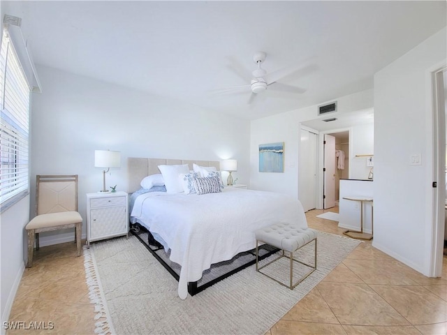 bedroom with light tile patterned floors and ceiling fan