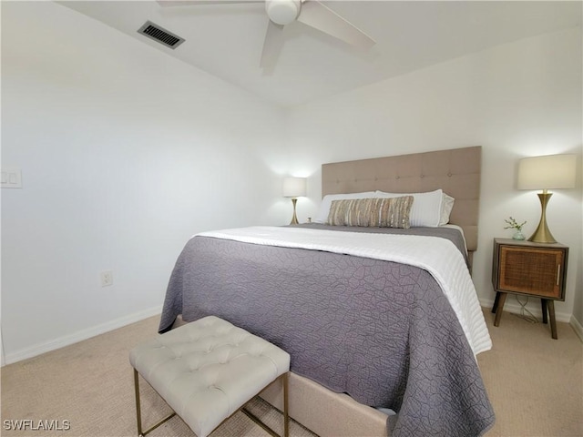 bedroom with light carpet and ceiling fan