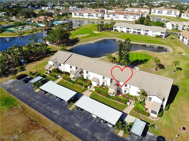 birds eye view of property featuring a water view