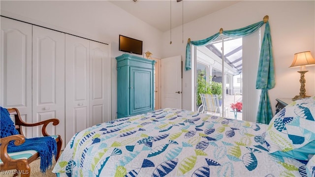 bedroom featuring access to exterior and a closet