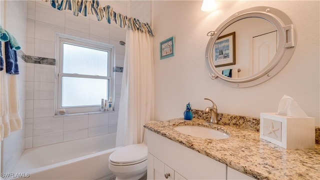 full bathroom with shower / bath combo with shower curtain, toilet, and vanity