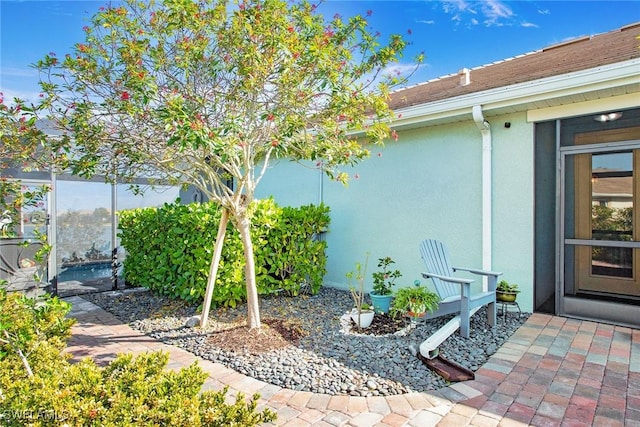 exterior space with stucco siding