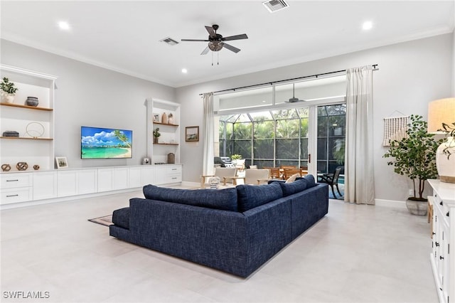 living room with ceiling fan and crown molding