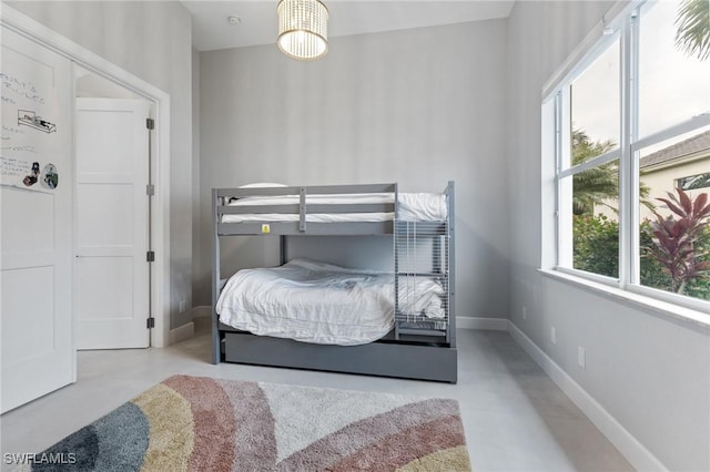 bedroom featuring multiple windows