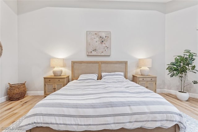 bedroom with light wood-type flooring