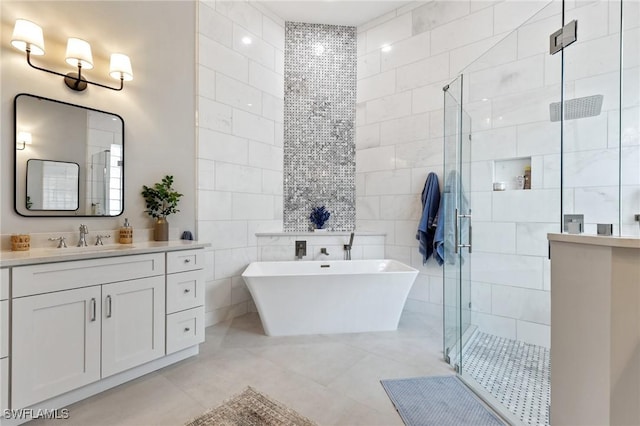 bathroom with vanity, separate shower and tub, and tile walls