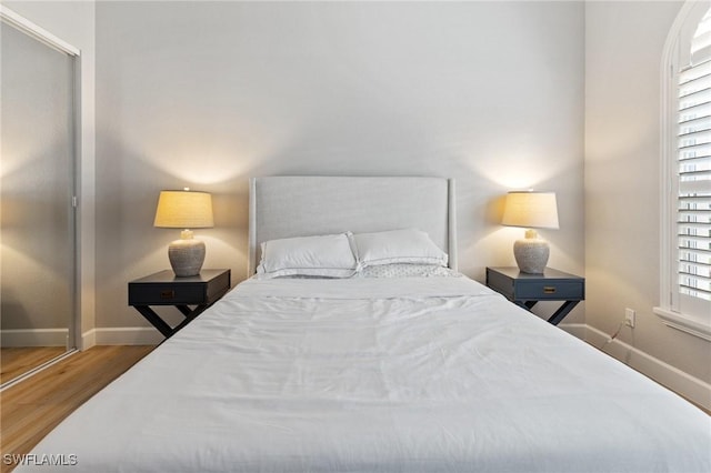 bedroom featuring hardwood / wood-style flooring