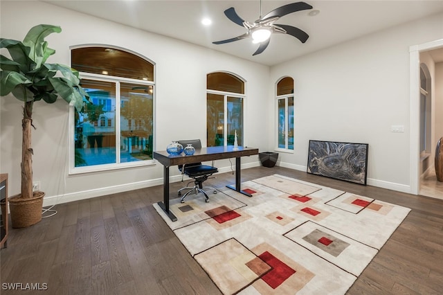 office with ceiling fan and dark hardwood / wood-style floors