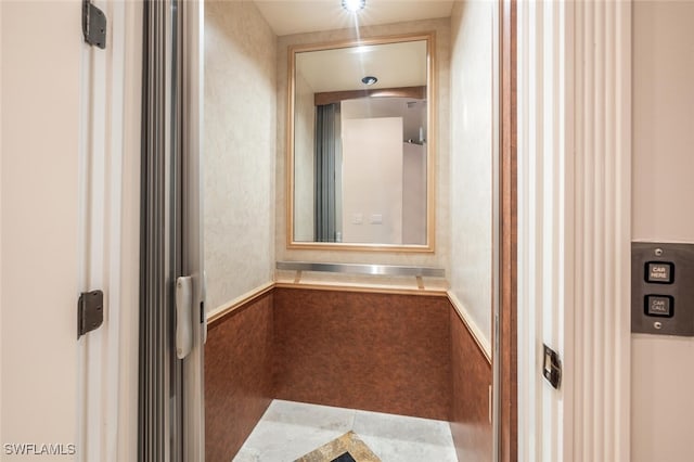 bathroom featuring elevator