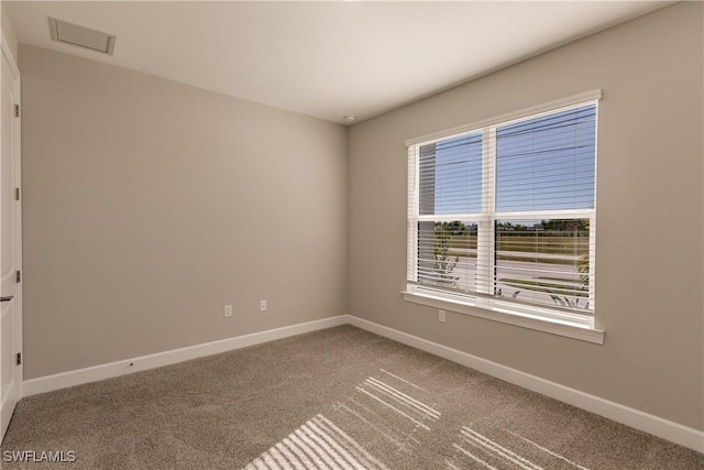 view of carpeted spare room