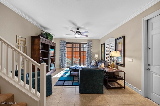 living room with ceiling fan, light tile patterned flooring, and crown molding