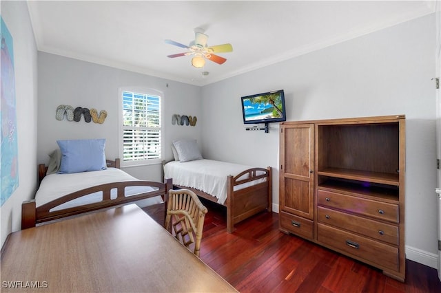 bedroom with ceiling fan, dark hardwood / wood-style floors, and ornamental molding