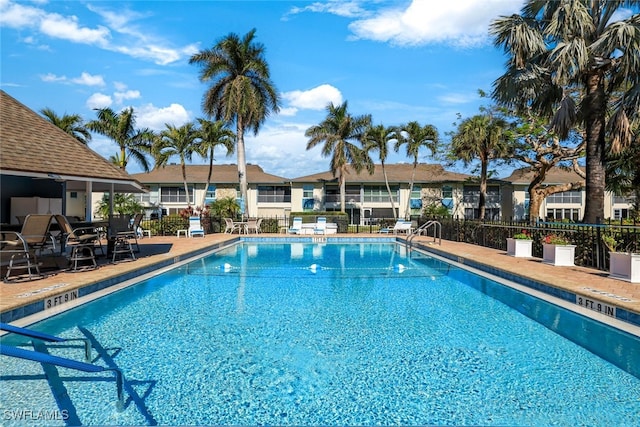 view of pool featuring a patio