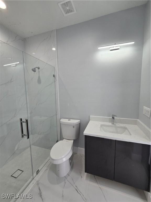 bathroom featuring walk in shower, vanity, and toilet