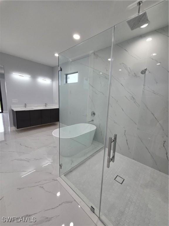 bathroom featuring vanity and plus walk in shower