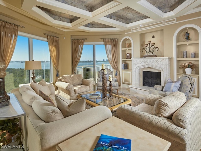 living room featuring built in shelves, beam ceiling, a high end fireplace, coffered ceiling, and a water view