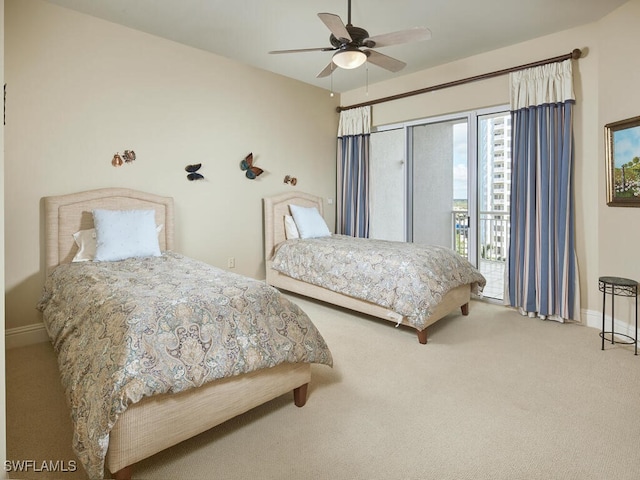 bedroom featuring carpet flooring, access to exterior, and ceiling fan